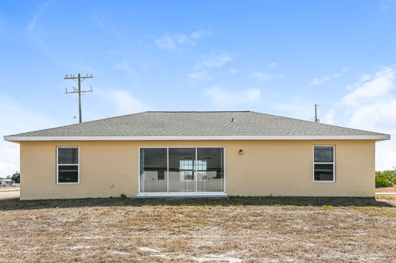 1,610/Mo, 3100 22nd St SW Lehigh Acres, FL 33976 Rear View