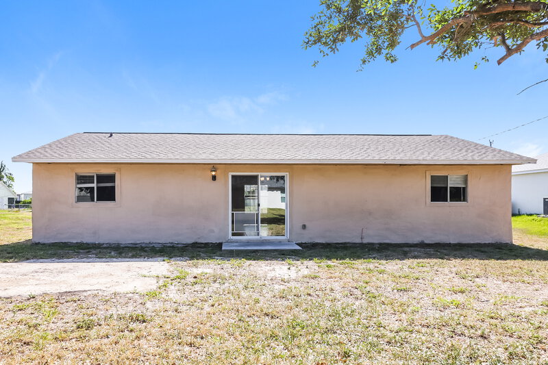 1,565/Mo, 1828 NW 2nd Pl Cape Coral, FL 33993 Rear View