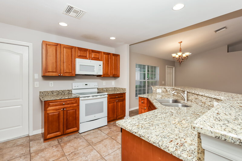1,915/Mo, 769 Oakridge Ave S Lehigh Acres, FL 33974 Kitchen View 3