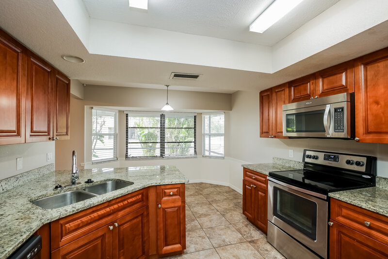 1,910/Mo, 18446 Elgin Ave Port Charlotte, FL 33948 Kitchen View 2