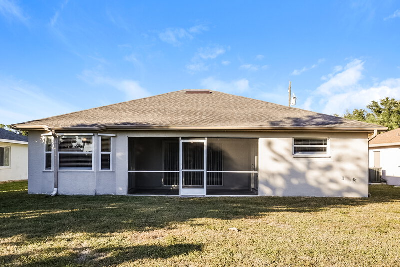 1,740/Mo, 187 Cougar Way Rotonda West, FL 33947 Rear View