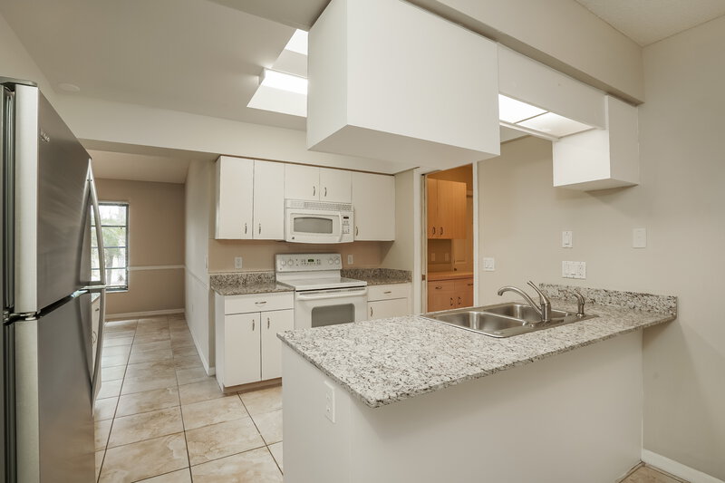 3,450/Mo, 278 Mark Twain Ln Rotonda West, FL 33947 Kitchen View