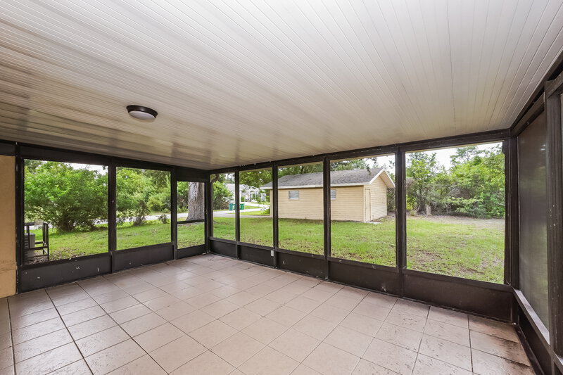 1,540/Mo, 7072 Bougainvillea St Englewood, FL 34224 Screened Patio View