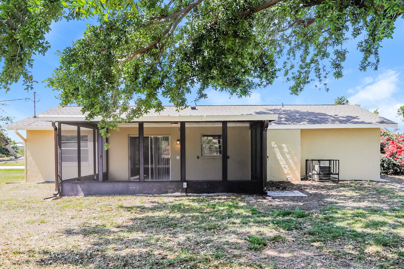1,850/Mo, 7072 Bougainvillea St Englewood, FL 34224 Rear View