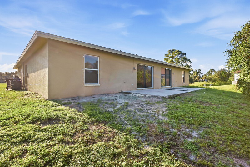 1,445/Mo, 736 Jack Ave S Lehigh Acres, FL 33973 Rear View