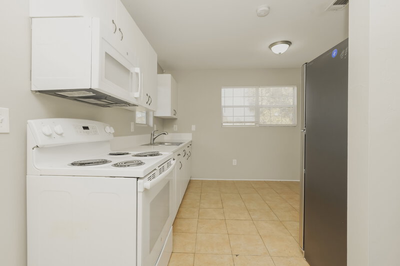 1,175/Mo, 5407 3rd Street W Lehigh Acres, FL 33971 Kitchen View 2