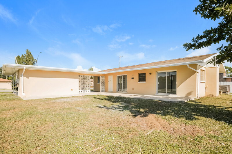 1,400/Mo, 502 Leeland Heights Boulevard E Lehigh Acres, FL 33936 Rear View