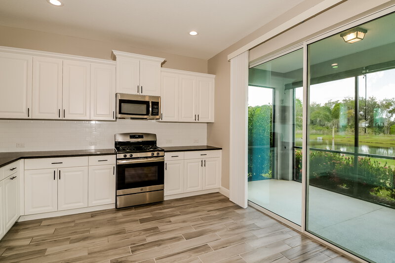 3,180/Mo, 10913 Shade Tree Cv Parrish, FL 34219 Kitchen View 3