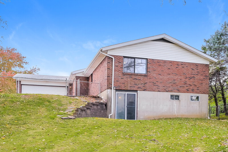 1,805/Mo, 3319 Tom Sawyer Dr Florissant, MO 63033 Rear View 2