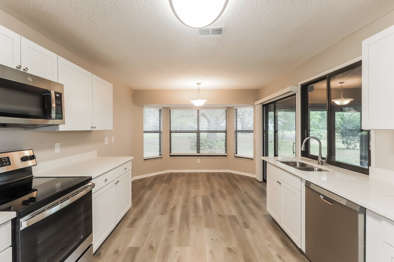 2,025/Mo, 34438 Cedarfield Dr Dade City, FL 33523 Kitchen View 2