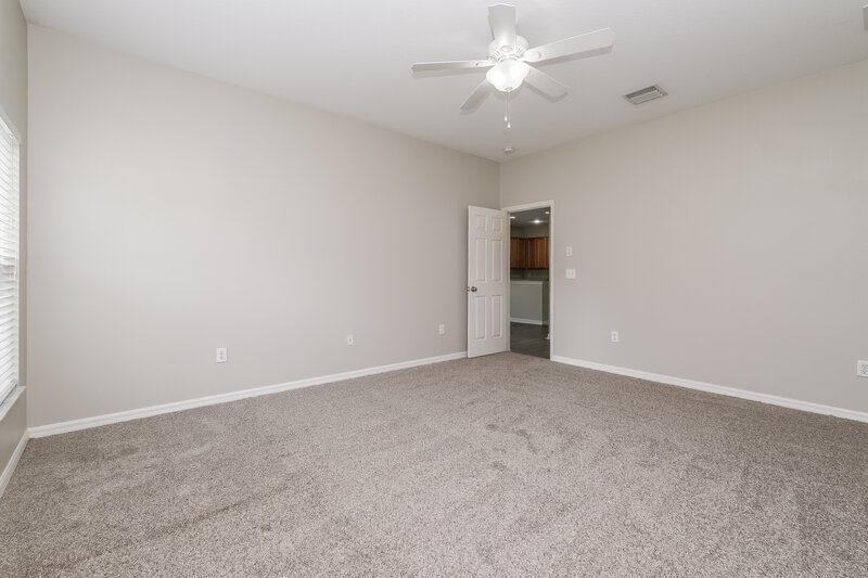 1,995/Mo, 10337 Celtic Ash Dr Ruskin, FL 33573 Main Bedroom View 2