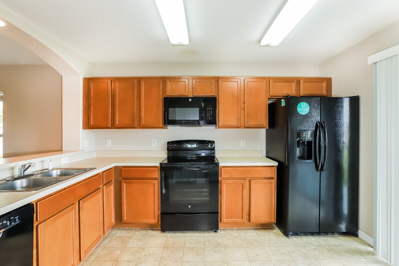 1,975/Mo, 7248 Lumber Port Dr Ruskin, FL 33573 Kitchen View 2
