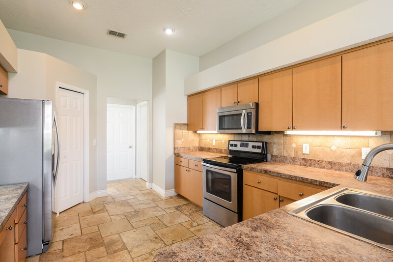 2,125/Mo, 13240 Prince Cir Hudson, FL 34669 Kitchen View 2