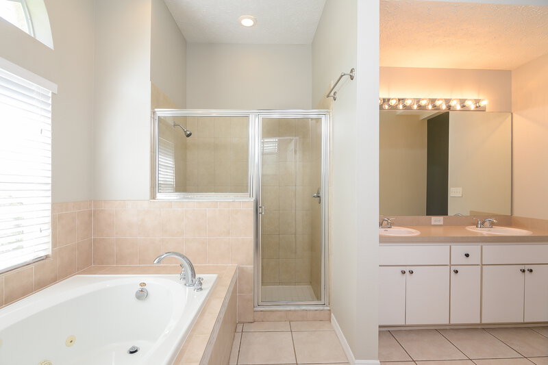 2,125/Mo, 13240 Prince Cir Hudson, FL 34669 Master Bathroom View