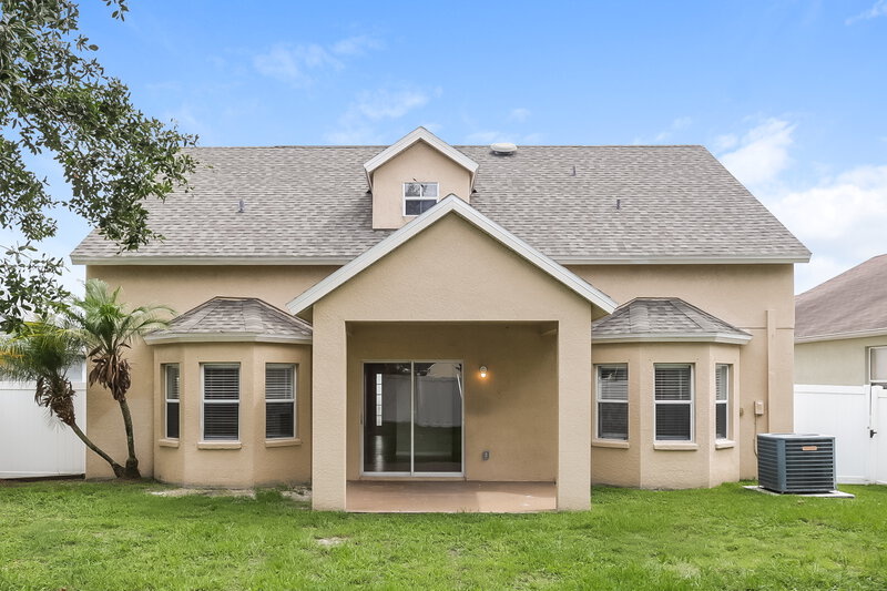 0/Mo, 17236 Poppy Fields Ln Land O' Lakes, FL 34638 Rear View