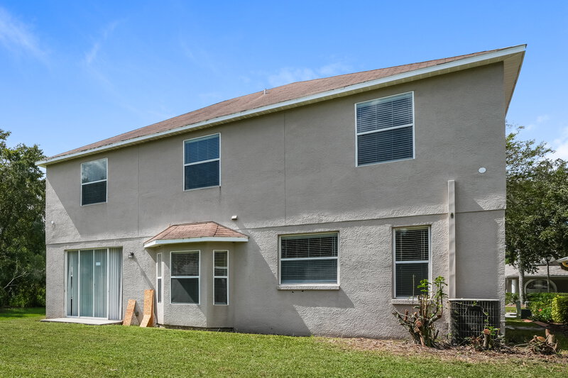 2,120/Mo, 7548 Blue Spring Dr Land O' Lakes, FL 34637 Rear View