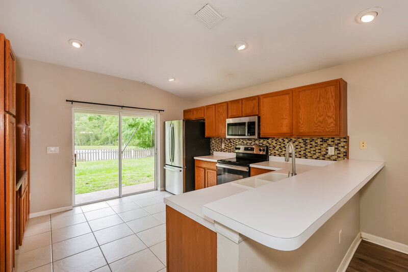 1,870/Mo, 12706 White Bluff Rd Hudson, FL 34669 Kitchen View 2