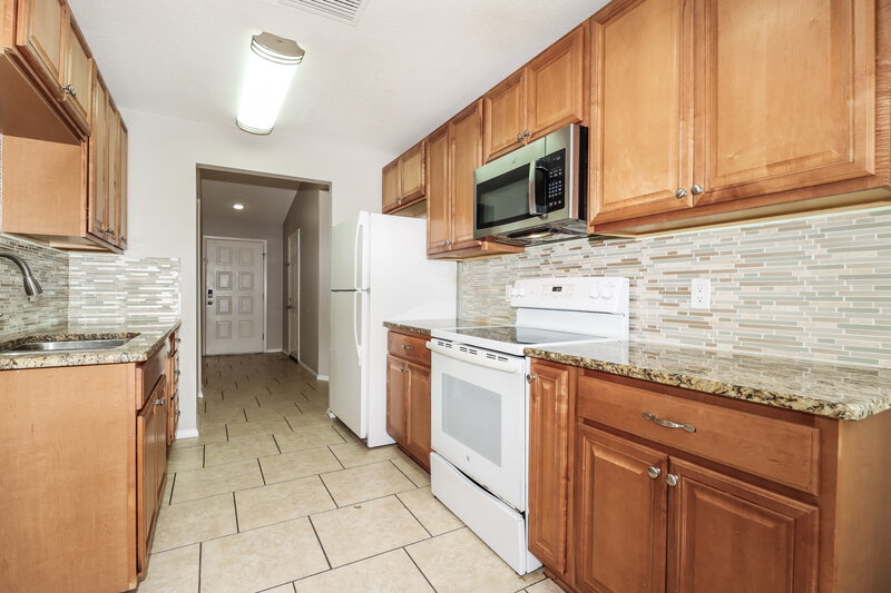 1,765/Mo, 8047 Hathaway Dr New Port Richey, FL 34654 Kitchen View 2