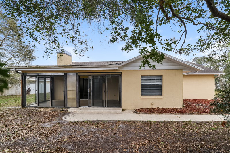 1,925/Mo, 12830 Pecan Tree Dr Hudson, FL 34669 Rear View