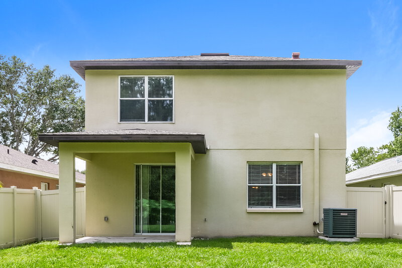 2,190/Mo, 7814 Citrus Blossom Dr Land O' Lakes, FL 34637 Rear View