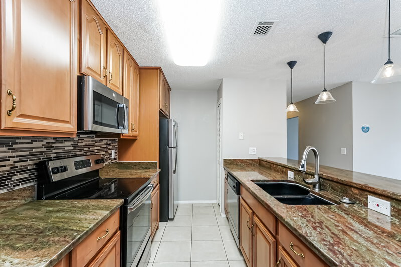 2,225/Mo, 6903 Silvermill Dr Tampa, FL 33635 Kitchen View 2