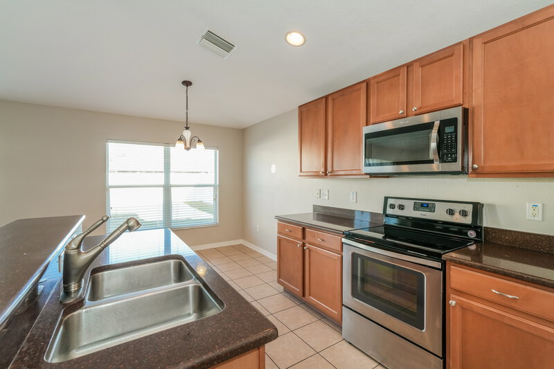 3,710/Mo, 6046 Desert Peace Ave Land O' Lakes, FL 34639 Kitchen View 2