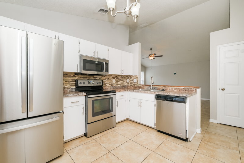 2,035/Mo, 1402 Dew Bloom Rd Valrico, FL 33594 Kitchen View