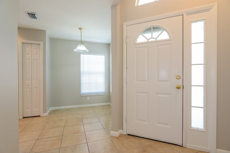 2,230/Mo, 6022 Gentle Ben Cir Wesley Chapel, FL 33544 Foyer Dining Room View