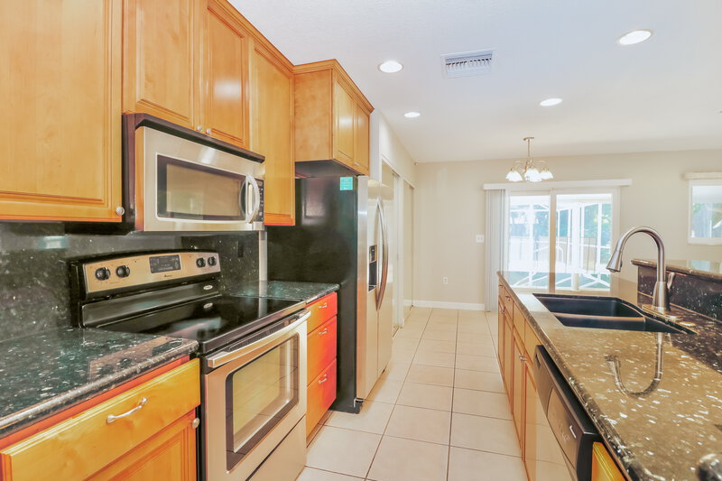 4,690/Mo, 1701 E Orangeside Rd Palm Harbor, FL 34683 Kitchen View 2