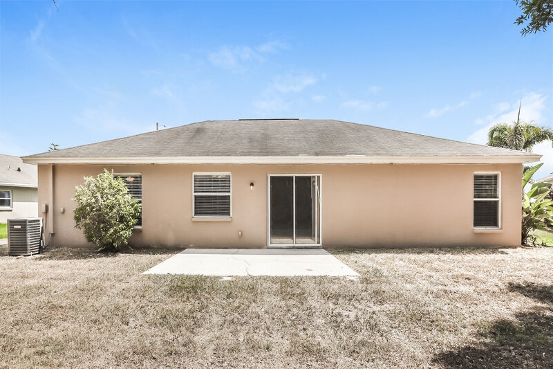 1,900/Mo, 184 Seven Oaks Dr Mulberry, FL 33860 Rear View 2