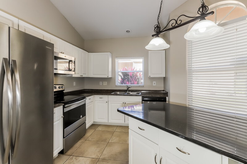 1,930/Mo, 5139  LOCHMEAD TERR Zephyrhills, FL 33541 Kitchen View 2