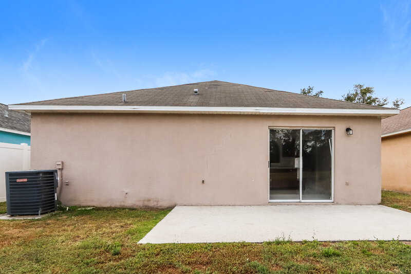 1,940/Mo, 30539 Birdhouse Dr Wesley Chapel, FL 33545 Rear View