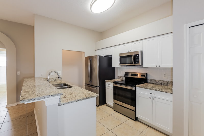 1,880/Mo, 7622 Weehawken Dr Zephyrhills, FL 33540 Kitchen View 2