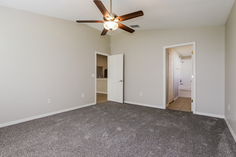 1,880/Mo, 7622 Weehawken Dr Zephyrhills, FL 33540 Main Bedroom View