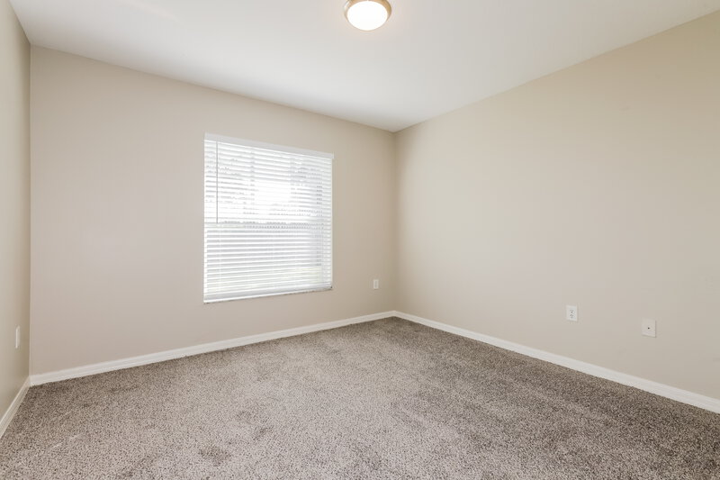 1,880/Mo, 7622 Weehawken Dr Zephyrhills, FL 33540 Bedroom View