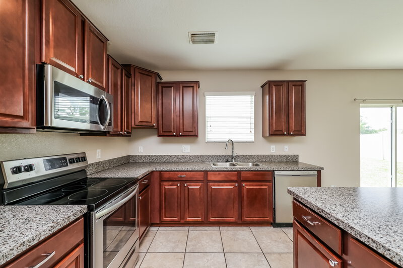 2,475/Mo, 1625 Climbing Dayflower Dr Ruskin, FL 33570 Kitchen View