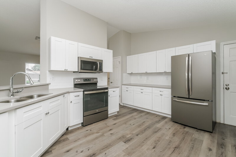 2,095/Mo, 4669 Swallowtail Dr New Port Richey, FL 34653 Kitchen View 2