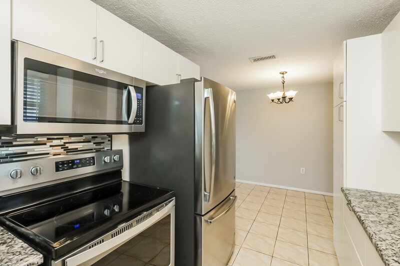1,735/Mo, 7921 Eugene Dr Port Richey, FL 34668 Kitchen View 2