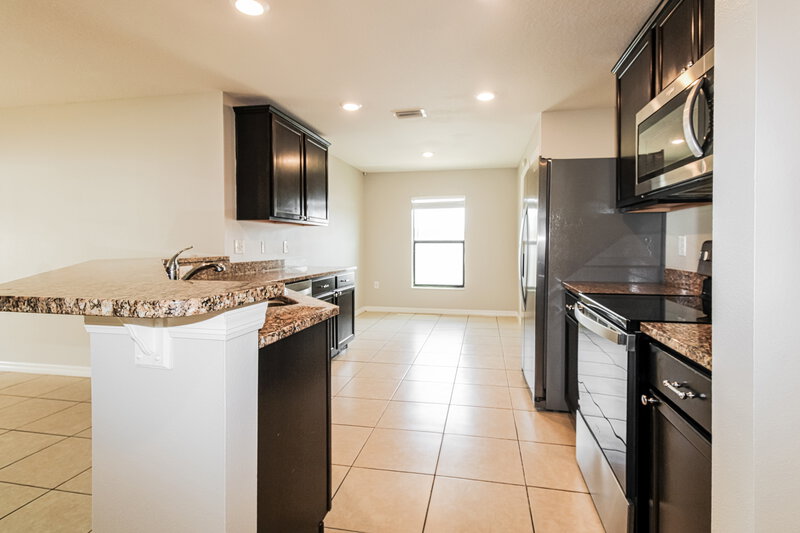 1,855/Mo, 4176 High Ridge Ave Spring Hill, FL 34609 Kitchen View 3