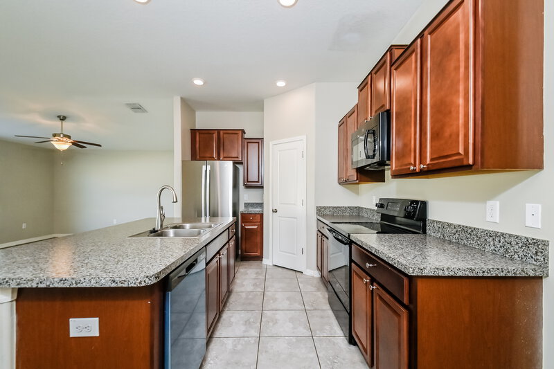 1,970/Mo, 8108 Cherry Branch Dr Ruskin, FL 33573 Kitchen View 2