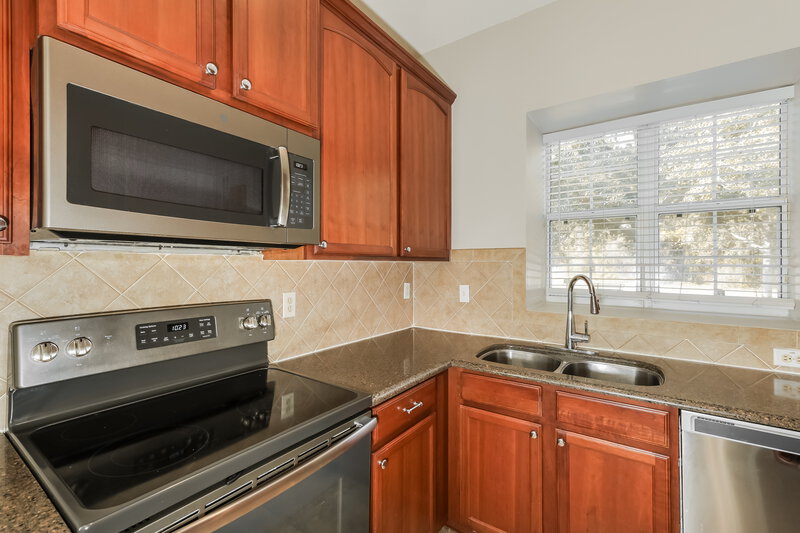 2,130/Mo, 11910 Old Tuscany Pl New Port Richey, FL 34654 Kitchen View 2