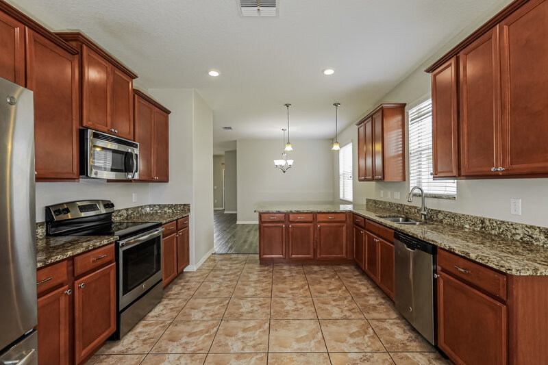 2,195/Mo, 2458 Dovesong Trace Dr Ruskin, FL 33570 Kitchen View 2