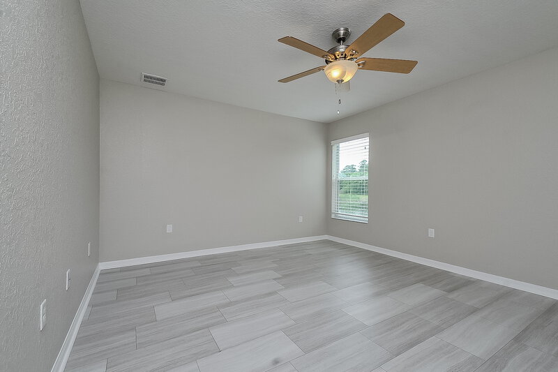 2,130/Mo, 6111 Evansbrook Dr Zephyrhills, FL 33541 Master Bedroom View 2