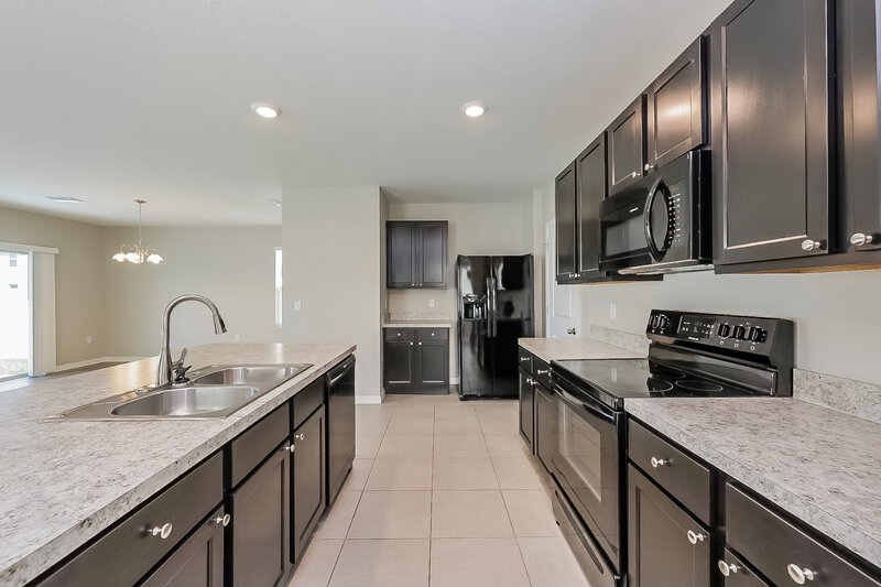 2,320/Mo, 10135 Mangrove Well Rd Sun City Center, FL 33573 Kitchen View