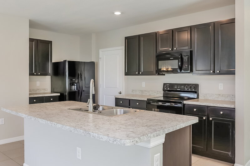 2,320/Mo, 10135 Mangrove Well Rd Sun City Center, FL 33573 Kitchen View 2