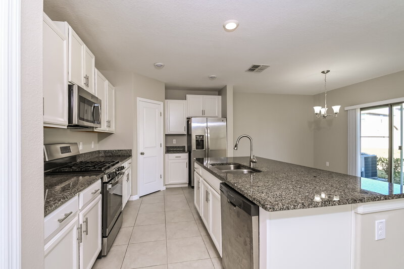 2,425/Mo, 9636 Lemon Drop Loop Ruskin, FL 33573 Kitchen View 2