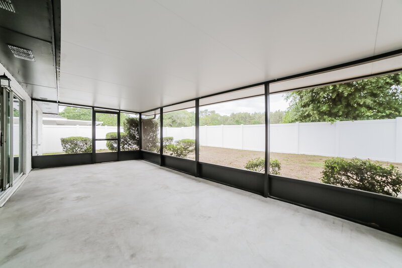 2,545/Mo, 7127 Hollowell Dr Tampa, FL 33634 Screen Porch View
