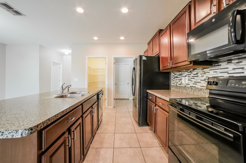 4,050/Mo, 6603 Trent Creek Dr Sun City Center, FL 33573 Kitchen View