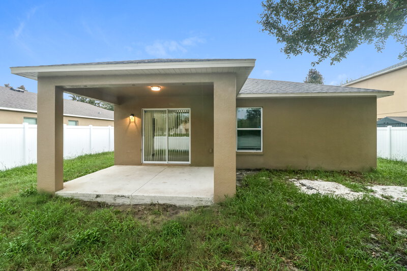 2,015/Mo, 15660 Greyrock Dr Spring Hill, FL 34610 Rear View