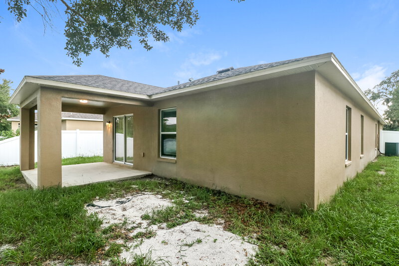 2,015/Mo, 15660 Greyrock Dr Spring Hill, FL 34610 Rear View 2